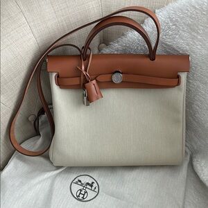 Authentic Herbag Zip 31 bag	
Color: béton/fauve